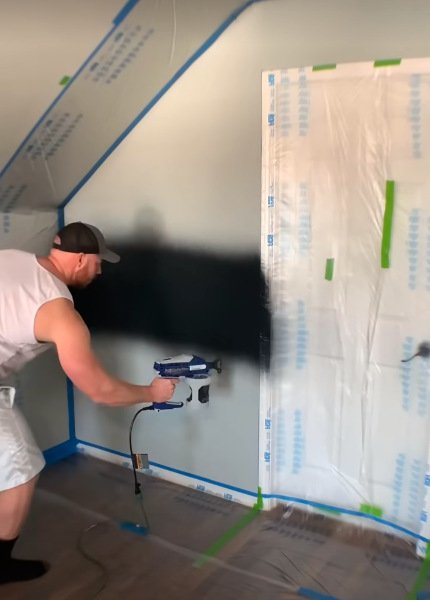 Spraying Paint on Wall